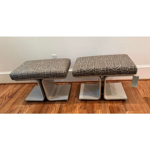 A nuanced study in detail and subtlety, this small ottoman introduces a sophisticated yet playful element to bedrooms and...