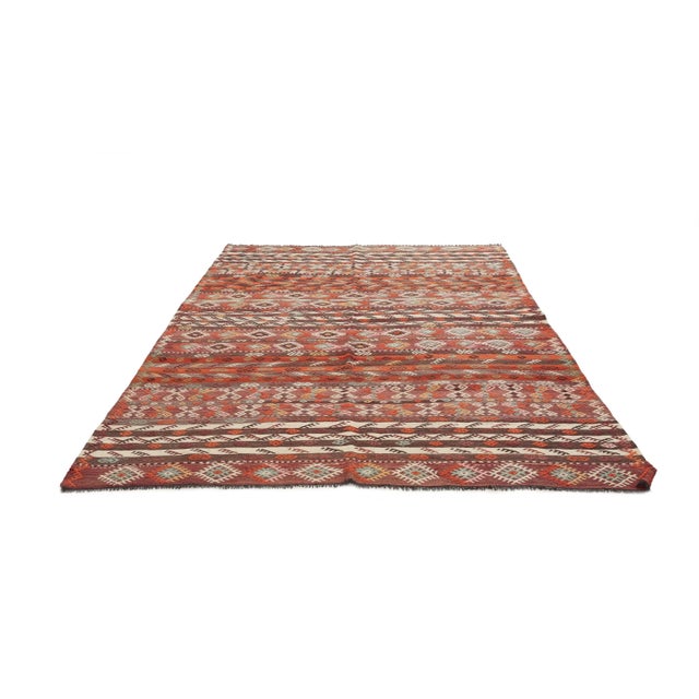 Vintage handwoven decorative kilim rug from Kars region of Turkey. Approximately 50-60 years old. In very good condition.