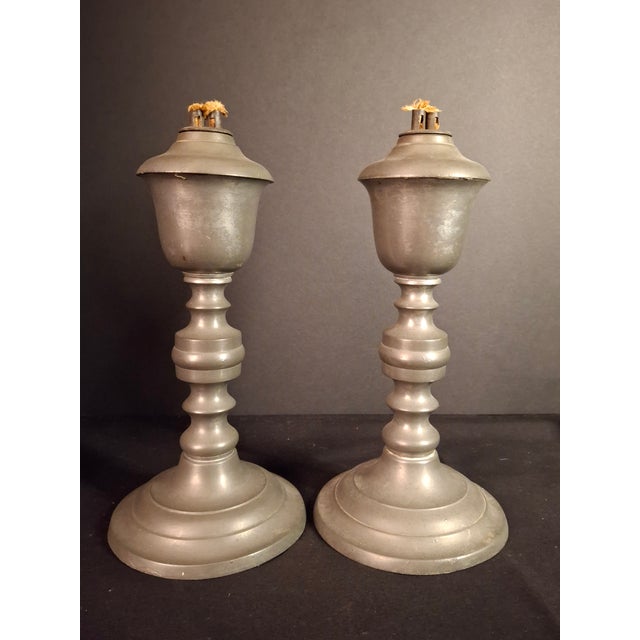 Up for sale is an exceptional, fully authentic pair of mid-19th-century American pewter whale oil stand lamps crafted by...