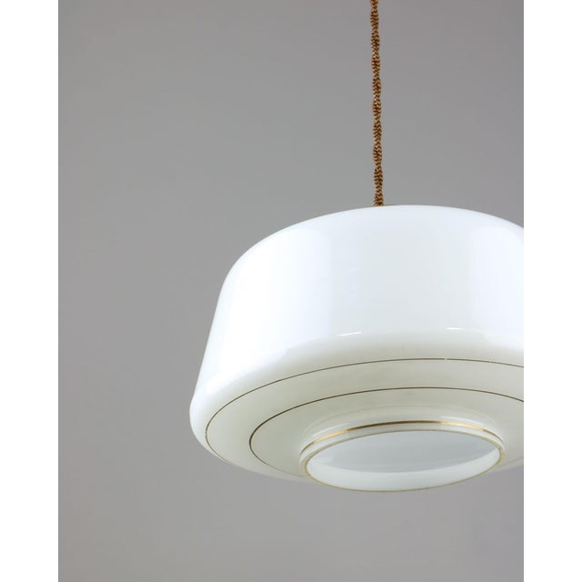 Lamp's cover is made of genuine brass material complementing this vintage item nicely with it's golden colour. total...