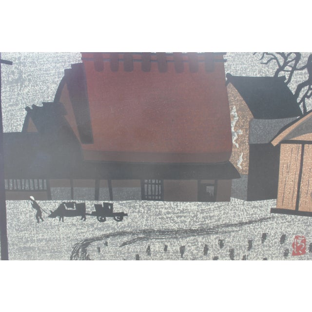 Landscape print of small Japanese city, Nara (A). Signature and seal lower right. Mat board covers the margins which may...