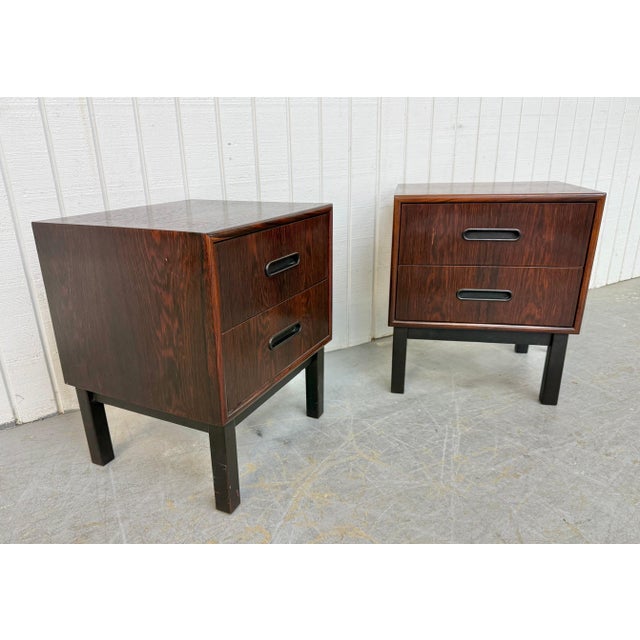 This listing is for a pair of Mid-Century Danish Modern Rosewood Nightstands. Featuring a straight line cube design, two...