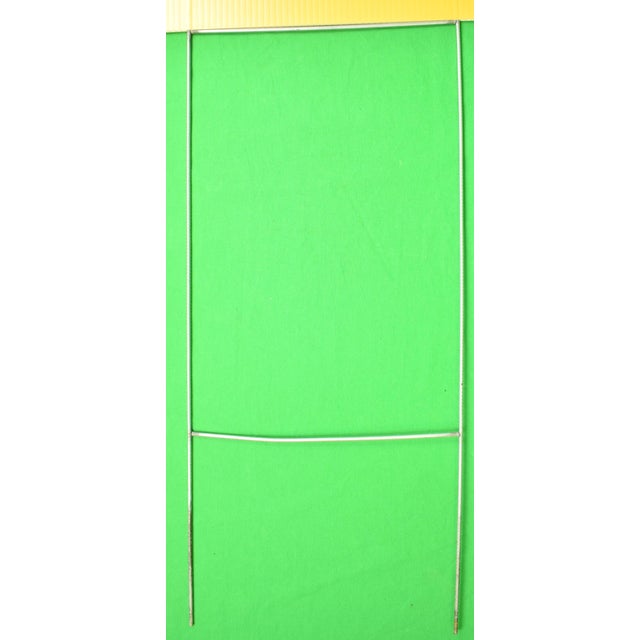 Sz: 18"H x 23 3/4"W Double-sided cardboard East Aurora, NY Mounted on metal divot 22 1/2" x 10"W