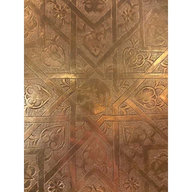 A stunning large 19th-century Islamic brass tray featuring exceptionally intricate hand-engraved geometric patterns,...