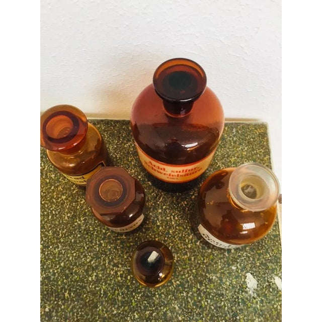 The glasses are of different sizes. The largest glass is 26cm tall and has a diameter of 13cm. The smallest glass is...