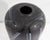 A 1989 art glass vase by the American glass artist Bob Toensing. Made of black glass, this vase features a geometric...