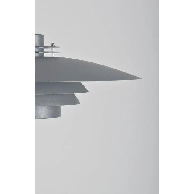 Danish hanging lamp with model name De-Lux manufactured in the 1980s by the company Design-Light. The different layers...