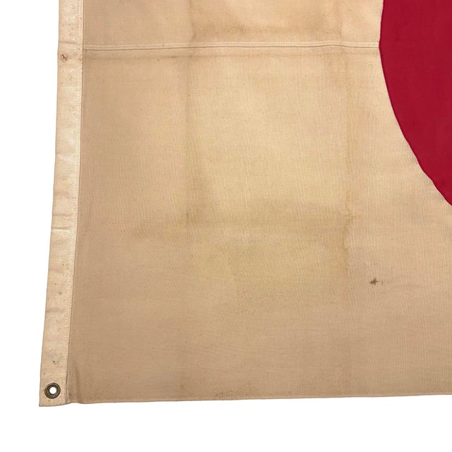 This vintage Japanese flag is made from a cotton cloth, with fully sewn red circle visible on both sides. Please note...