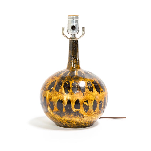 This petite, ceramic gourd lamp has an incredible, variegated, spotted glaze. A bold, yet versatile piece; great for a...