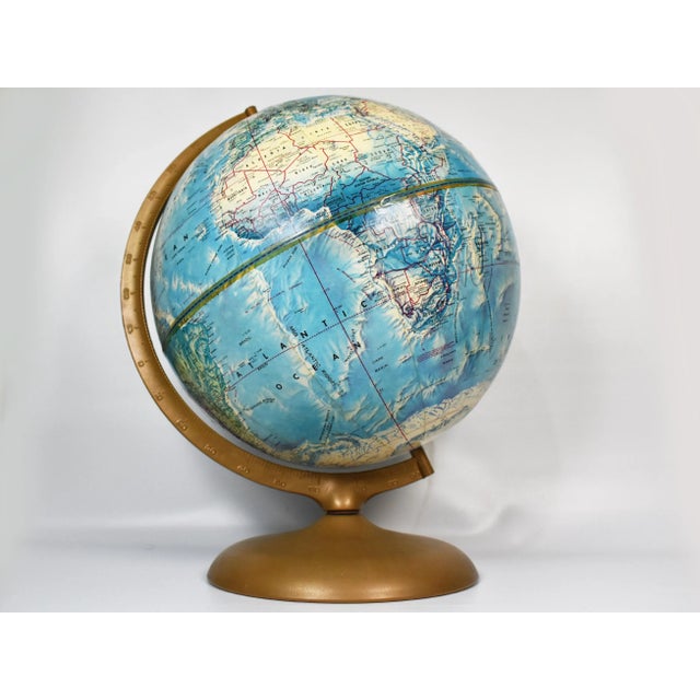 Beautiful mid century Rand McNally portrait world will enhance any home or office décor. The globe has nice unique antique...