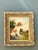 This exquisite early 20th-century oil on canvas by artist Jem Nutt captures a poised Spaniel within a serene pastoral...