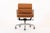 This authentic Eames for Herman Miller Soft Pad Management Height brown leather office chair from the Aluminum Group...