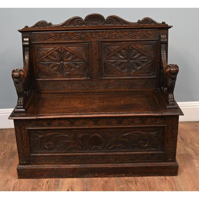 Fine Victorian carved oak hall settle dating from circa 1880 Elaborately carved throughout with geometric, foliate and...