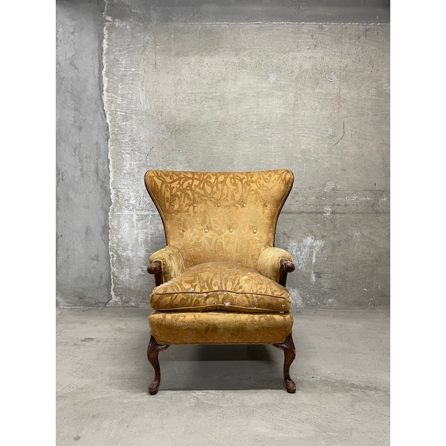This traditional wingback armchair is extraordinary! This beautiful wingback sits on an elegant wood frame characterized...