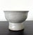 A celadon ceramic stem bowl with impressive patina from Korea, circa 17th centuries of mid Joseon Dynasty. With high...