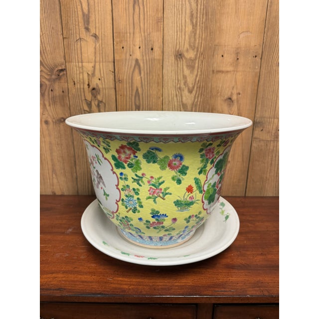 Dress up your houseplants with this beautiful asian ceramic planter and coordinating saucer. Each side features a bird on...