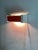 Wall Lamp by Niek Hiemstra Orange for Hiemstra Evolux, 1970, in Very Good conditions. Designed 1970 to 1979 I have...