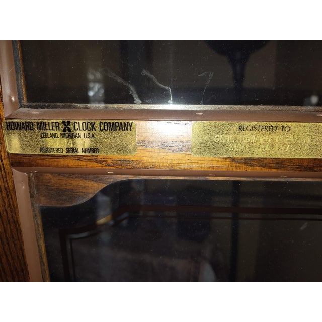 A distinguished and beautifully preserved Howard Miller grandfather clock, registered in 1979 and maintained with...