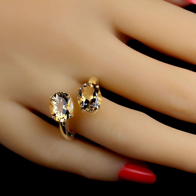 This is part of Chairish’s Fine Jewelry assortment. Gorgeous Golden Beryls in Gold rhodium over Sterling Silver bypass...