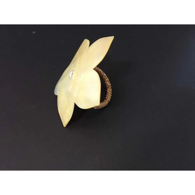 Set of six napkin rings in natural capiz pearl in flower star shape. Luminous, beautiful pearl shell color. vintage set of...