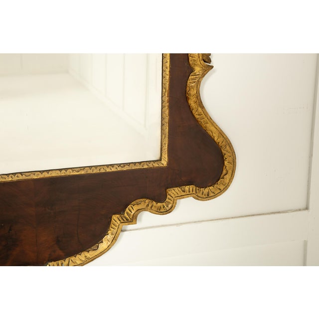 Large 18th century english walnut and gilt mirror a splendid, large 18th century english walnut and gilt mirror. in the...