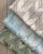 This full-coverage embroidery uses a space-dyed yarn with a distinct thread stitched in highlight colours. The arrow-tip...