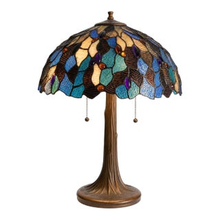 Vintage Tiffany Style Double-Light Art Glass Table Lamp With Sculpted Bronze-Tone Base For Sale