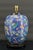 Important Chinese lamp in blue ceramic decorated with butterflies and flowers. China. QING dynasty, Tongzhi era, 1861-1875...