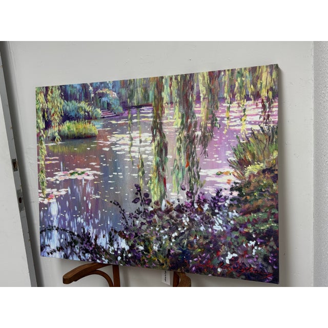 Design Plus Gallery presents “Homage to Monet” by David Lloyd Glover. This impressionist landscape depicts a tranquil lily...
