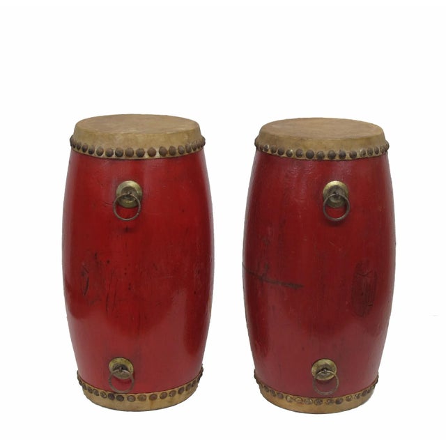 This lovely pair vintage red drum adds color, texture, and cheerful feeling to any space. Dimension: 5.5"W, 5.5"D, 13"H...