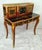 Bring refined European elegance to your workspace with this French Louis XV-inspired writing desk, featuring a rich...