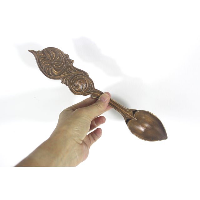 Vintage hand carved wooden spoon in the style of a Welsh love spoon. The last photo shows other spoons available...