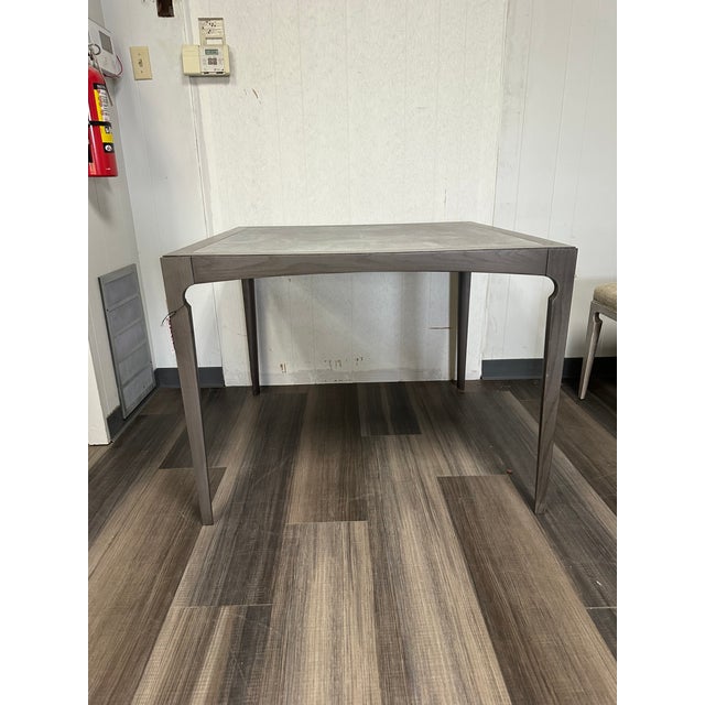 The Danforth Game Table is a refined blend of classic craftsmanship and purposeful design, created for gathering,...