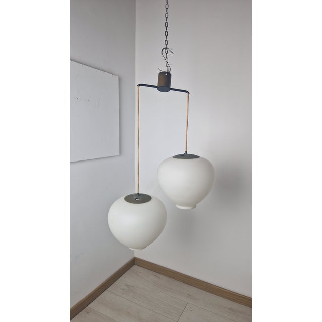 Pendant Light in Brass with Opal Glasses from Stilnovo, 1960s, in Very Good conditions. Designed 1960 to 1969 I have...