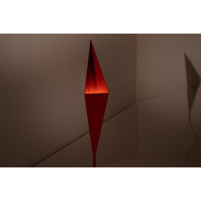 This floor lamp stands out for its bold graphic language and markedly experimental character, typical of European design...