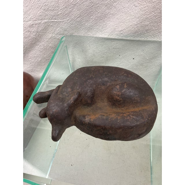 Unusual black painted iron doorstop of a resting fox. Some areas of paint wear and rusting in recessed areas. 7” long 1...