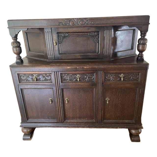 Antique 1920s Jacobean Revival Carved Oak Court Cupboard Buffet For Sale