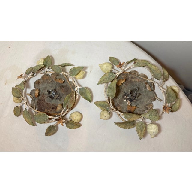 Add a touch of antique charm to your decor with these antique cold-painted wrought iron candle holder centerpieces,...
