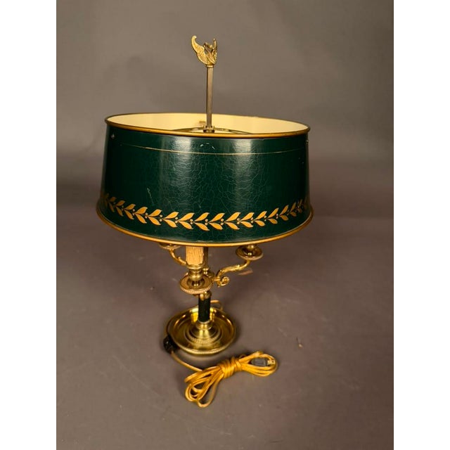 Late 19th-century French Empire bouillotte lamp dating to circa 1890, featuring a distinctive three-arm candelabra form...
