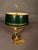 Late 19th-century French Empire bouillotte lamp dating to circa 1890, featuring a distinctive three-arm candelabra form...