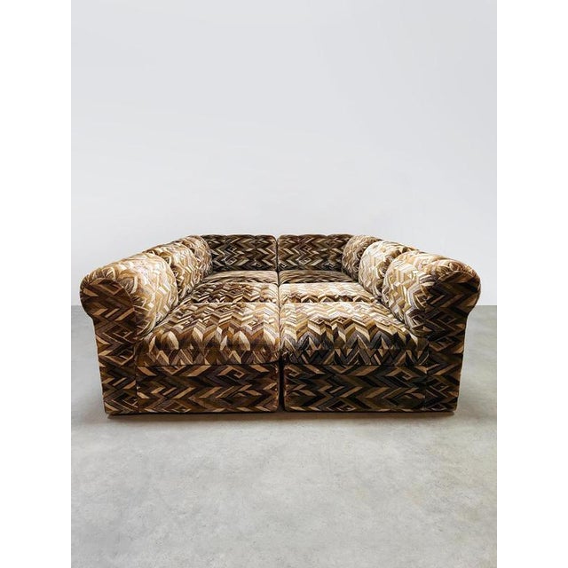 It's lounge time with this vintage modular lounge sofa in a graphic design. The element sofa consists of 6 separate...