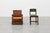 A distinctive Belgian Art Deco lounge chair dating from the 1920s, combining artisanal craftsmanship with the warm...