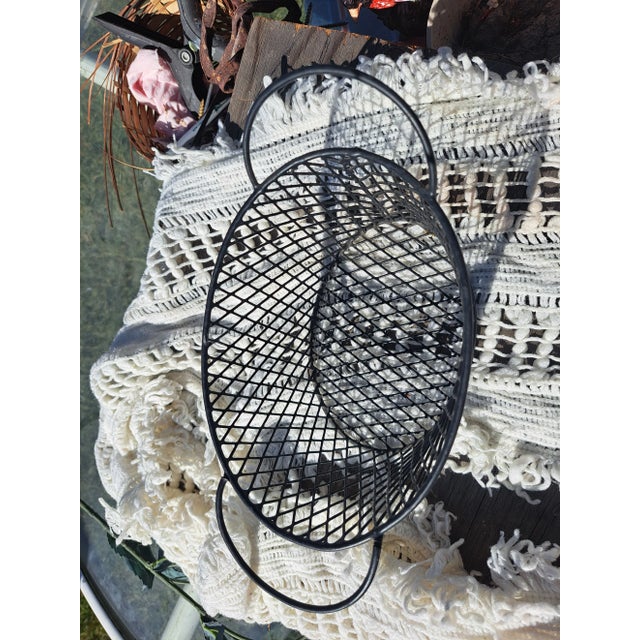 mid century iron black two handle egg basket weaved pattern no flaws. vintage