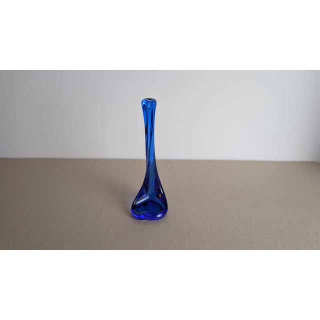 A single handcrafted "Bone" series cobalt blue crystal candlestick designed by Elsa Peretti for Tiffany & Company in the...