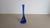 A single handcrafted "Bone" series cobalt blue crystal candlestick designed by Elsa Peretti for Tiffany & Company in the...