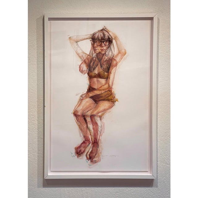 Play by Jane Radstrom | Pastel on paper of a seated woman in a bikini with glasses. For Sale