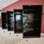 This is a set of 4 vintage midcentury modern tanker style steel bookcases with original black powder coating. They were...