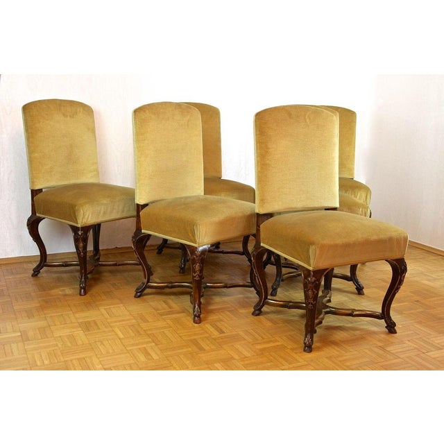 Exquisite set of six handcarved baroque dining chairs from the late period around 1790 in Italy. These stunning Italian...