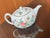 Vintage Wedgwood bone china teapot in the Charnwood pattern (WD 3984) featuring a floral and butterfly design with gold...