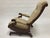 A distinctive Victorian Eastlake platform rocking chair, crafted in solid wood and dating to the late 19th century. This...